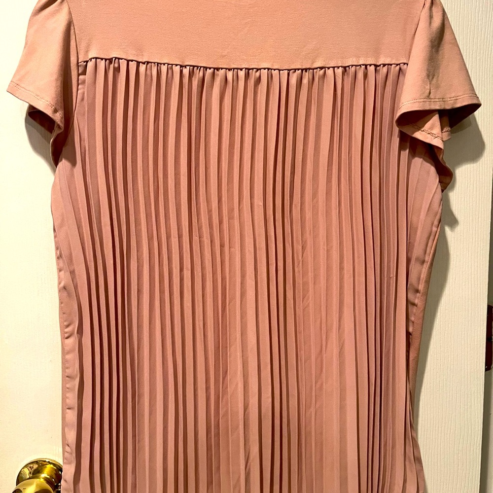 Never worn size M blush colored blouse